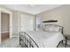 Cozy bedroom with a plush bed, natural light, and stylish accents at 6957 Black Forest Dr, Elizabeth, CO 80107