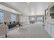 Bright and spacious living area with contemporary furniture, great for entertaining and relaxing at 6957 Black Forest Dr, Elizabeth, CO 80107