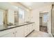 Bathroom vanity features granite countertops, dual sinks, and updated fixtures at 9544 Pitkin St, Commerce City, CO 80022