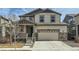 Charming two-story home with a two car garage, and neutral color palette at 9544 Pitkin St, Commerce City, CO 80022