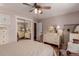 Bright bedroom with ceiling fan, large mirrored closet, hardwood floors and plenty of natural light at 6043 S Cody Way, Littleton, CO 80123