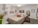 Bedroom with comfortable bed, soft lighting, and charming decor at 6043 S Cody Way, Littleton, CO 80123