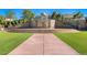 Tiered community space with art installation, surrounded by grass, trees and community landscaping at 8645 Coors St, Arvada, CO 80005
