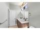 Bathroom featuring double sinks, modern vanity, and a towel rack at 3220 W 20Th Ave # 1, Denver, CO 80211