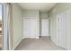 Bedroom with carpet, closet, and access to additional rooms at 3220 W 20Th Ave # 1, Denver, CO 80211
