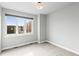 Bedroom with large window and neutral carpet at 3220 W 20Th Ave # 1, Denver, CO 80211