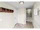 Open foyer features tiled floors, coat rack and staircase access at 3220 W 20Th Ave # 1, Denver, CO 80211
