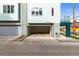 Attached two car garage offers extra parking, storage, and additional entrance to the home at 3220 W 20Th Ave # 1, Denver, CO 80211