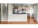 Modern kitchen with stainless steel appliances and quartz countertops at 3220 W 20Th Ave # 1, Denver, CO 80211