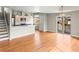 Open living space with modern kitchen and access to a balcony at 3220 W 20Th Ave # 1, Denver, CO 80211