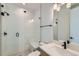 Modern bathroom featuring a glass enclosed shower and bright vanity at 1875 Hickory Ave, Erie, CO 80516