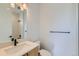 Contemporary bathroom showcasing stylish vanity, mirror, and fixtures at 1875 Hickory Ave, Erie, CO 80516