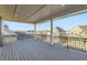 Spacious covered deck with stunning views of surrounding neighborhood at 1875 Hickory Ave, Erie, CO 80516