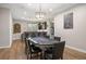 Entertaining game room with bar, poker table, and hardwood floors, perfect for hosting gatherings at 858 Swandyke Dr, Castle Rock, CO 80108
