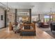Open concept living space featuring hardwood floors, natural lighting, and stylish decor at 858 Swandyke Dr, Castle Rock, CO 80108