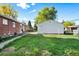 The spacious backyard includes a detached garage/storage shed and is perfect for outdoor activities and gardening at 6506 Lee St, Arvada, CO 80004