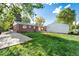 Large lot features a big backyard with a detached garage/storage area at 6506 Lee St, Arvada, CO 80004