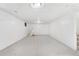 Spacious finished basement with neutral carpet and a decorative patterned ceiling at 6506 Lee St, Arvada, CO 80004