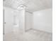 Finished basement area featuring neutral carpet, recessed lighting and additional storage at 6506 Lee St, Arvada, CO 80004