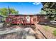 Traditional brick home has a nice front porch and walkway leading to the entry way at 6506 Lee St, Arvada, CO 80004