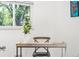 Bright home office with a simple desk and chair setup, perfect for work or study with ample natural light at 6506 Lee St, Arvada, CO 80004