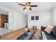 A view of the living room leads to a kitchen in this open floor plan at 6506 Lee St, Arvada, CO 80004