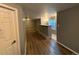 Finished basement area, great for entertaining with vinyl floors and a bar area at 13031 Dexter St, Thornton, CO 80241