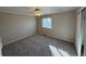 Spacious bedroom featuring a ceiling fan and natural light from a window at 13031 Dexter St, Thornton, CO 80241