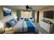 Stylishly furnished bedroom with cozy decor, serene window view, and modern furnishings at 13031 Dexter St, Thornton, CO 80241