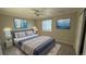 Bedroom featuring relaxing decor, plush carpet, lots of natural light, and stylish wall art at 13031 Dexter St, Thornton, CO 80241