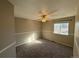 A cozy bedroom space with ceiling fan and a window with natural lighting at 13031 Dexter St, Thornton, CO 80241