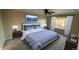 Comfortable bedroom boasting relaxing decor, soft lighting, and a serene view at 13031 Dexter St, Thornton, CO 80241
