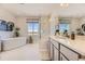 Luxurious bathroom featuring a standalone tub, glass-enclosed shower, and modern double vanity at 13940 Hanging Lake St, Parker, CO 80138