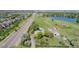 Overhead view of home with pool, outbuildings, and proximity to roads and neighborhood at 14447 Madison St, Thornton, CO 80602