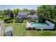 Estate featuring a pool, large deck, and expansive lawn, perfect for relaxation and outdoor activities at 14447 Madison St, Thornton, CO 80602