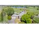Charming home near a serene lake, featuring a pool, outbuildings, and a large lawn at 14447 Madison St, Thornton, CO 80602