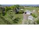 Sprawling property featuring a house, barn, pool, and extensive green spaces, ideal for outdoor living at 14447 Madison St, Thornton, CO 80602