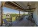 Inviting deck area with plenty of seating and a scenic view at 14447 Madison St, Thornton, CO 80602