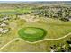 Aerial view of a neighborhood with a golf course at 5192 Sedona Dr, Parker, CO 80134
