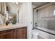 Well-maintained bathroom with a vanity, mirror, and shower-tub combination at 5192 Sedona Dr, Parker, CO 80134