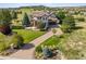 Stunning home featuring a grand circular driveway and beautifully landscaped front yard in a desirable location at 5192 Sedona Dr, Parker, CO 80134