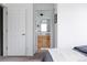 Bathroom entrance with light wood vanity at 4500 E Louisiana Ave, Denver, CO 80246