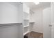 Walk in closet space with built-in shelving at 4500 E Louisiana Ave, Denver, CO 80246