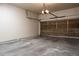 Spacious garage with overhead lighting and plenty of space for storage and parking at 4500 E Louisiana Ave, Denver, CO 80246
