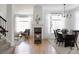 Bright living room featuring a modern fireplace, wood floors, and neutral decor, creating a cozy and inviting space at 4500 E Louisiana Ave, Denver, CO 80246