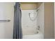 Bathroom showcasing shower and tub combo with white tile at 9557 W San Juan Cir # 306, Littleton, CO 80128