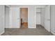 Bedroom view to bathroom and walk-in closet at 9557 W San Juan Cir # 306, Littleton, CO 80128