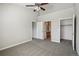 Open bedroom with multiple closets at 9557 W San Juan Cir # 306, Littleton, CO 80128