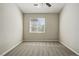 Serene bedroom features a ceiling fan and ample natural light at 9557 W San Juan Cir # 306, Littleton, CO 80128