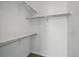 Walk-in closet with shelving units at 9557 W San Juan Cir # 306, Littleton, CO 80128